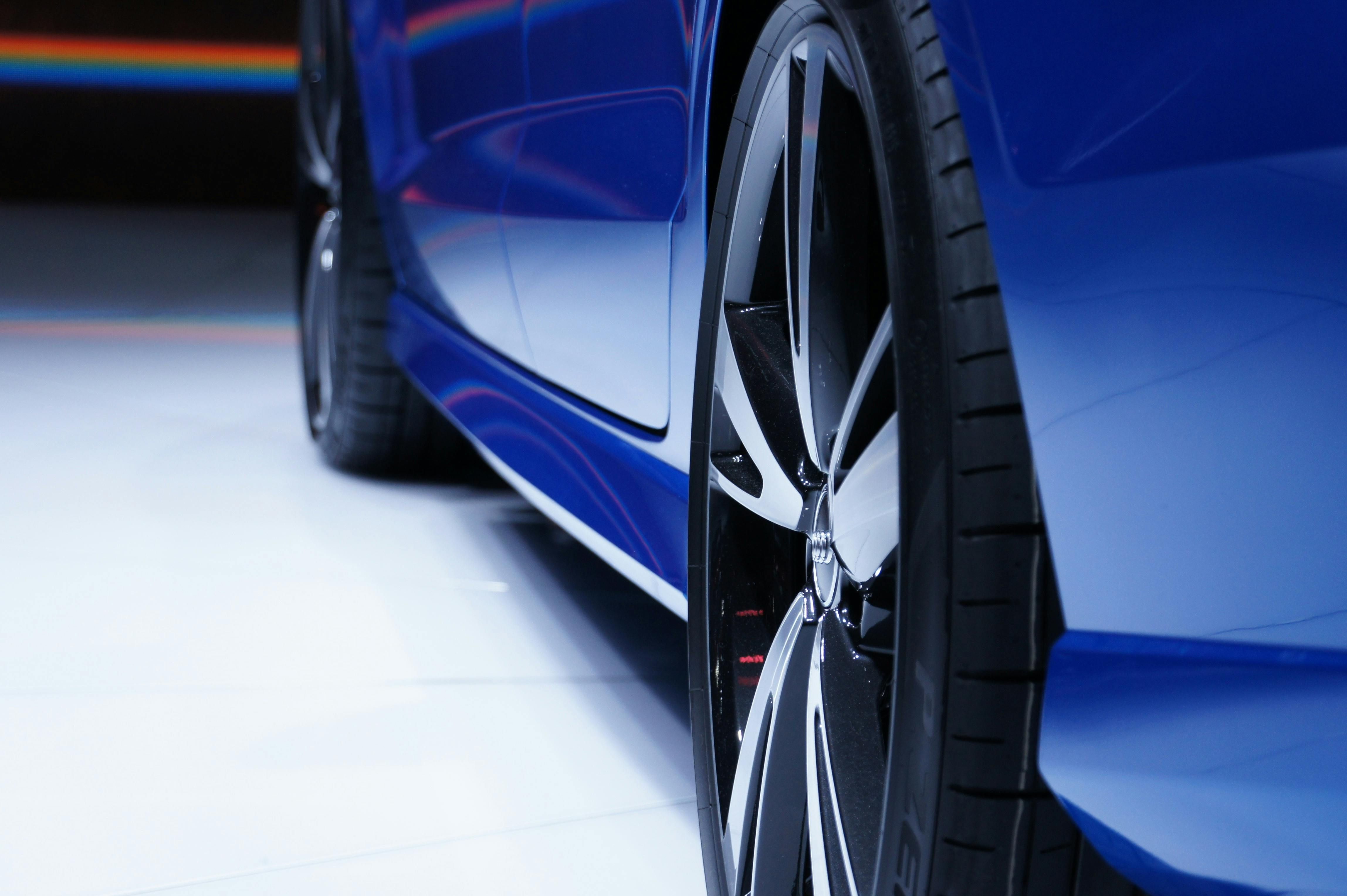 Luxury car driving on road